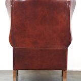 Large comfortable sheepleather wingchair in good condition and beautiful colours