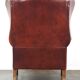 Large comfortable sheepleather wingchair in good condition and beautiful colours