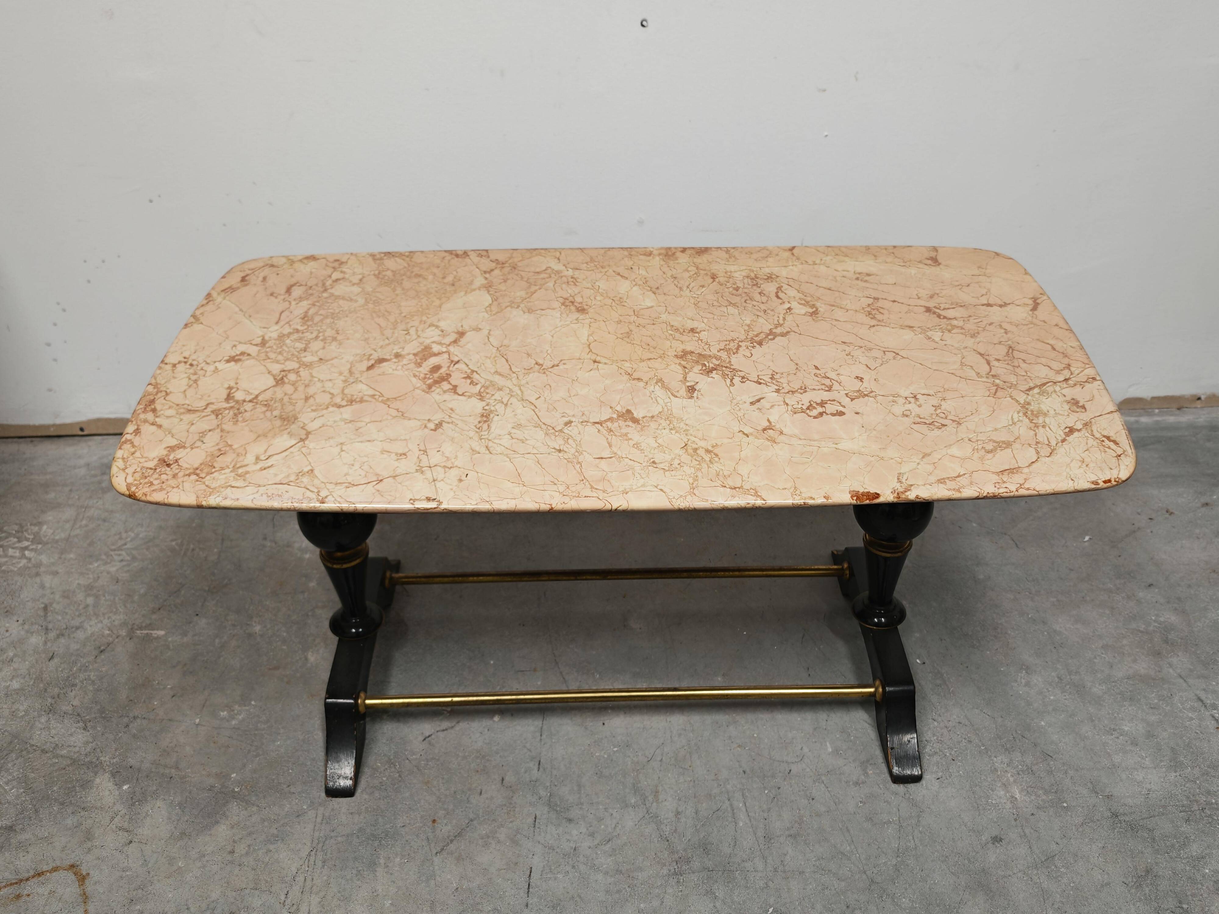 Mid-century modern coffee table in marble, brass, and wood, 1950s.