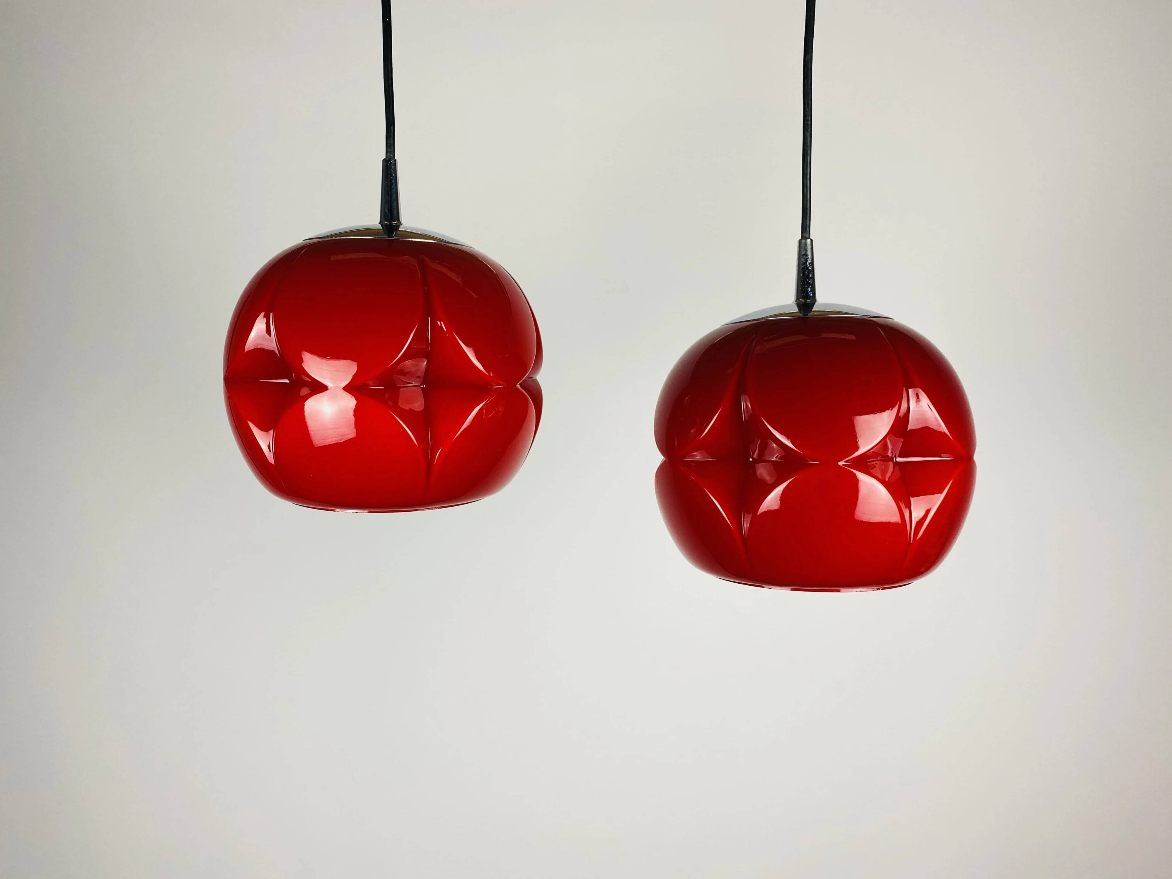Pair of artichoke glass pendants in red by Peill and Putzler 1960