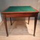 Rectangular console that transforms into a game table.