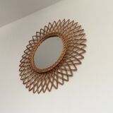 Sun mirror in braided rattan. 1960. 52cm.