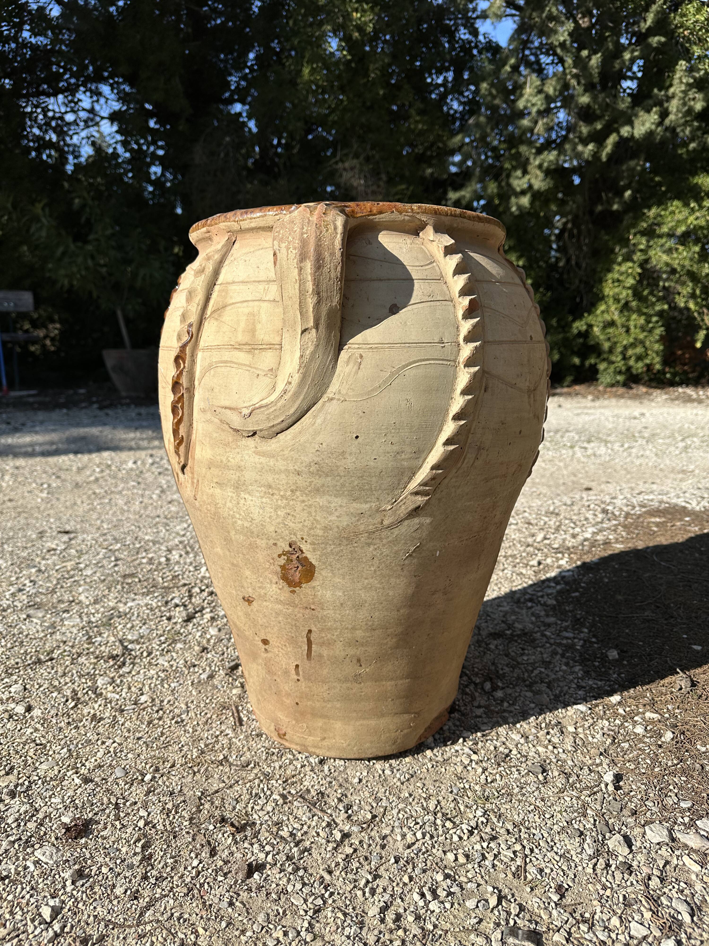 Ancient terracotta pottery jar