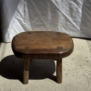 Small stool, oval solid teak accent stool with a two-tone seat.