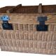 Wicker travel trunk XIX with metal clasps and handles.