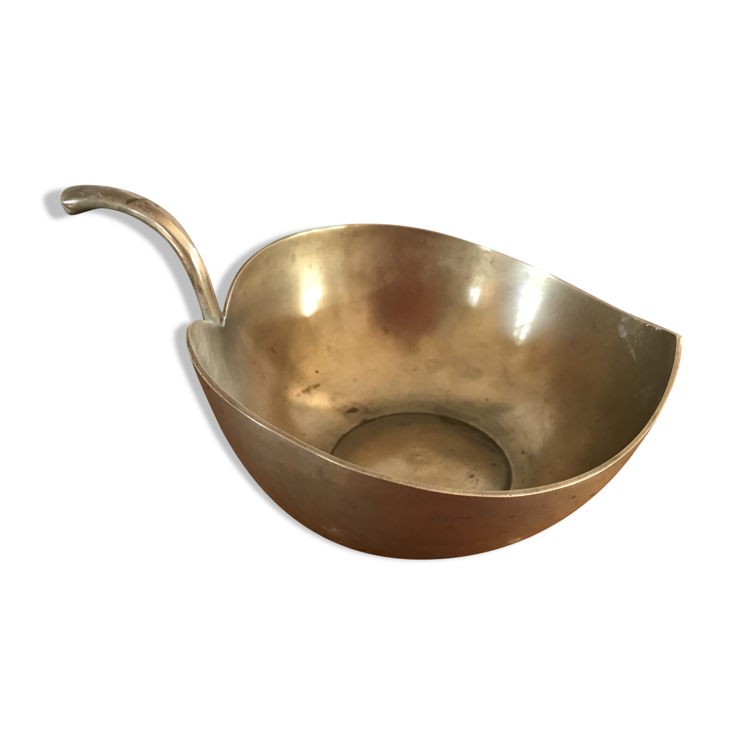 Empty brass apple pocket