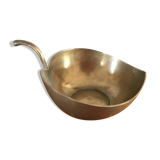 Empty brass apple pocket