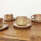 4 sandstone cups with under cups