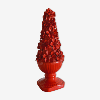 Ceramic sculpture or centerpiece of red-flowered manias