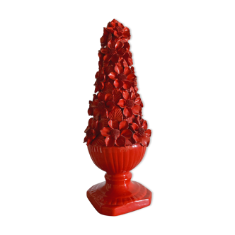 Ceramic sculpture or centerpiece of red-flowered manias