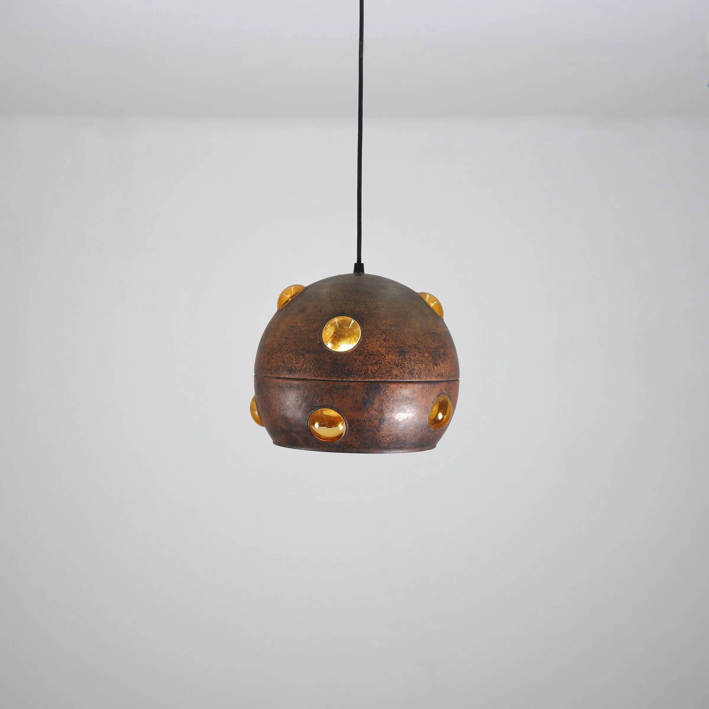 Large, globular brutalist hanging lamp in copper / glass by Peill & Putzler