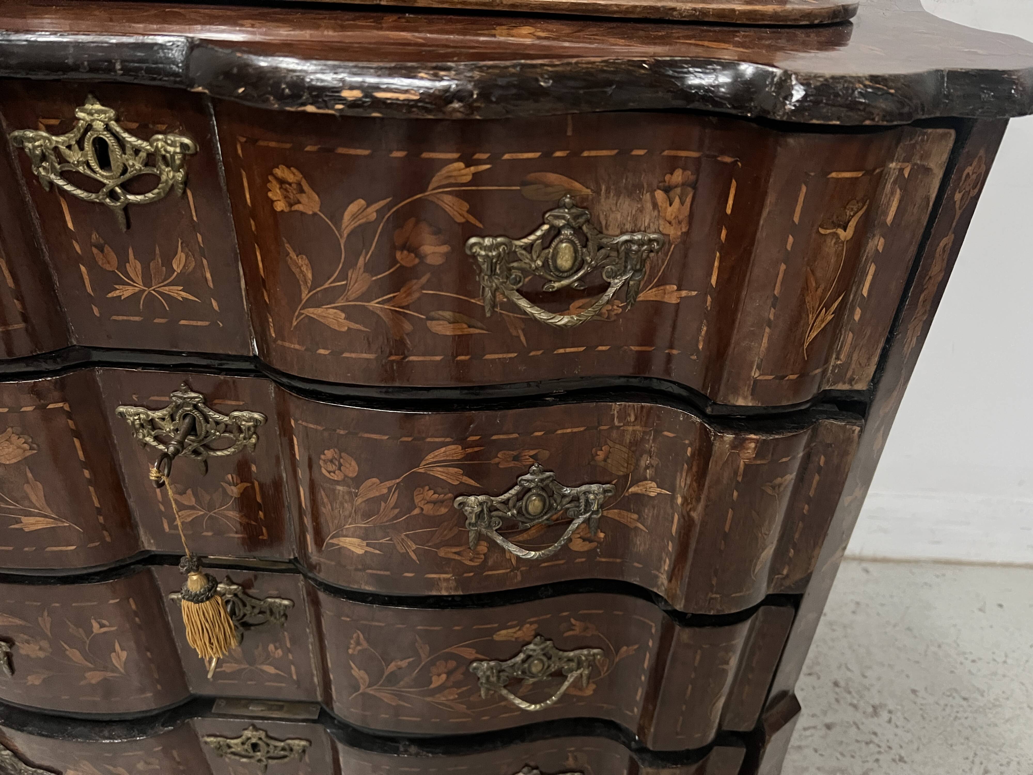 Dutch display cabinet in two parts made of marquetry wood.
