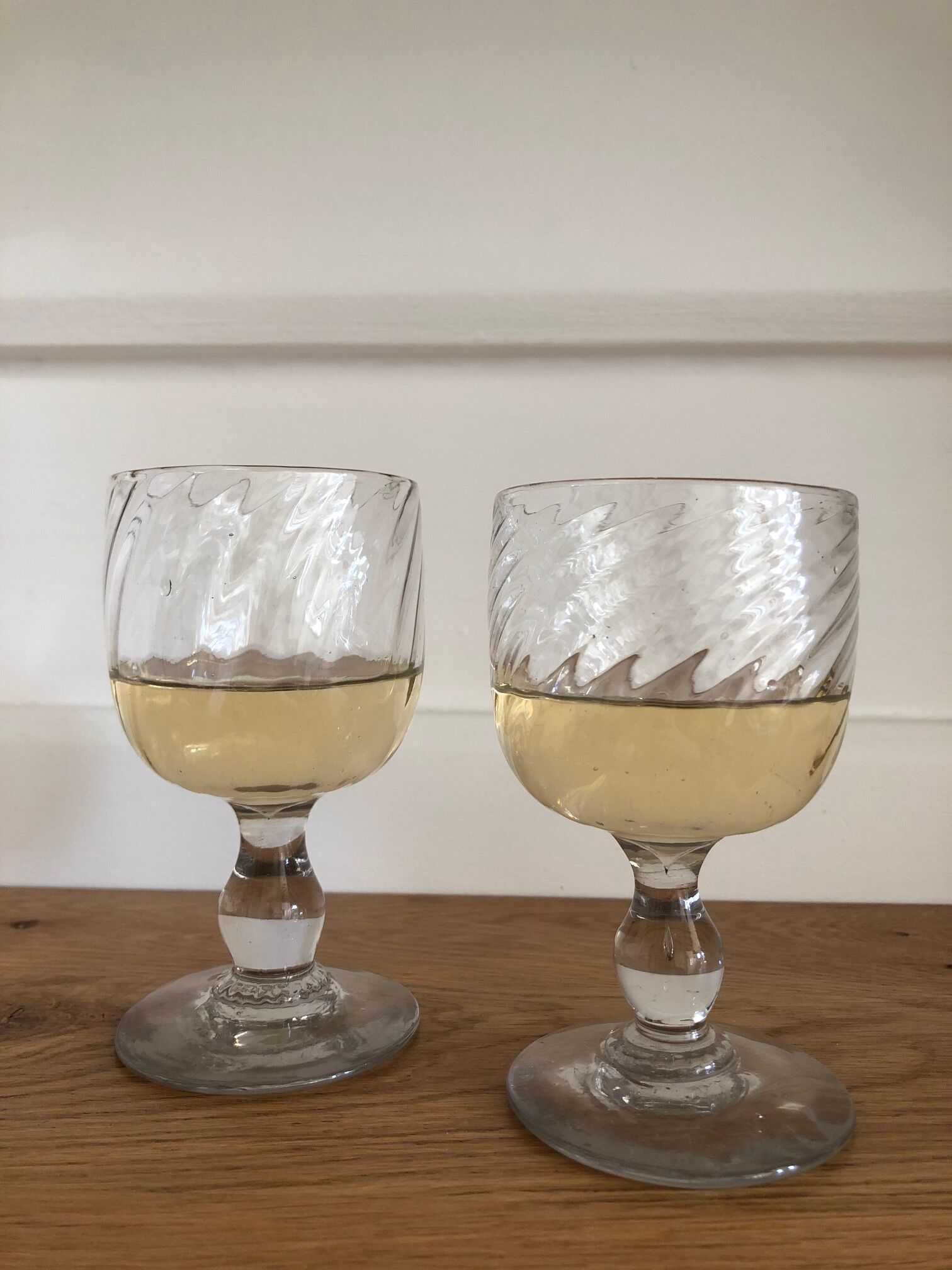 Two old wine glasses, torsaded, blown glass, France - late 19th century