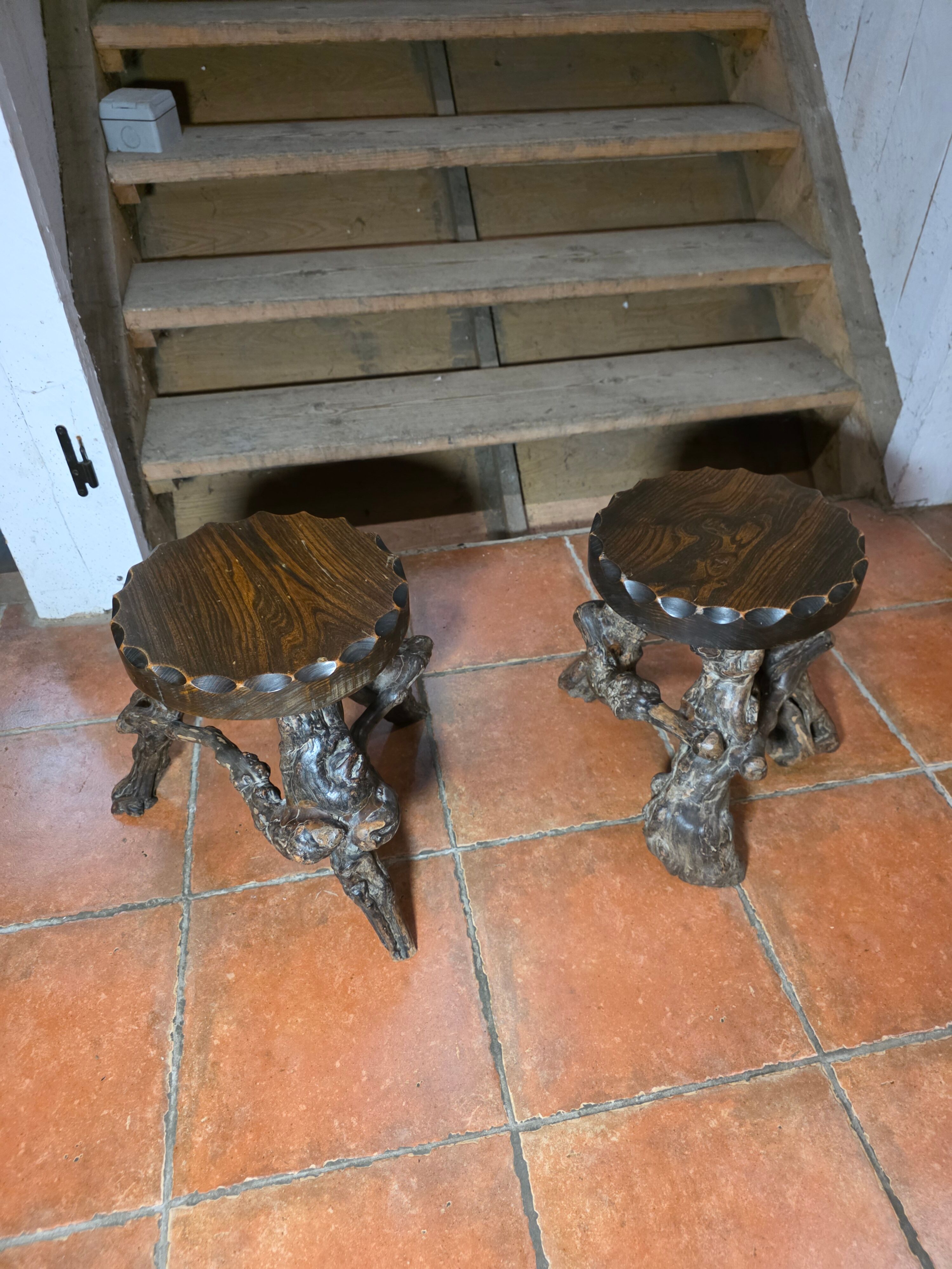 Pair of tripod stools with vine legs, oak top.