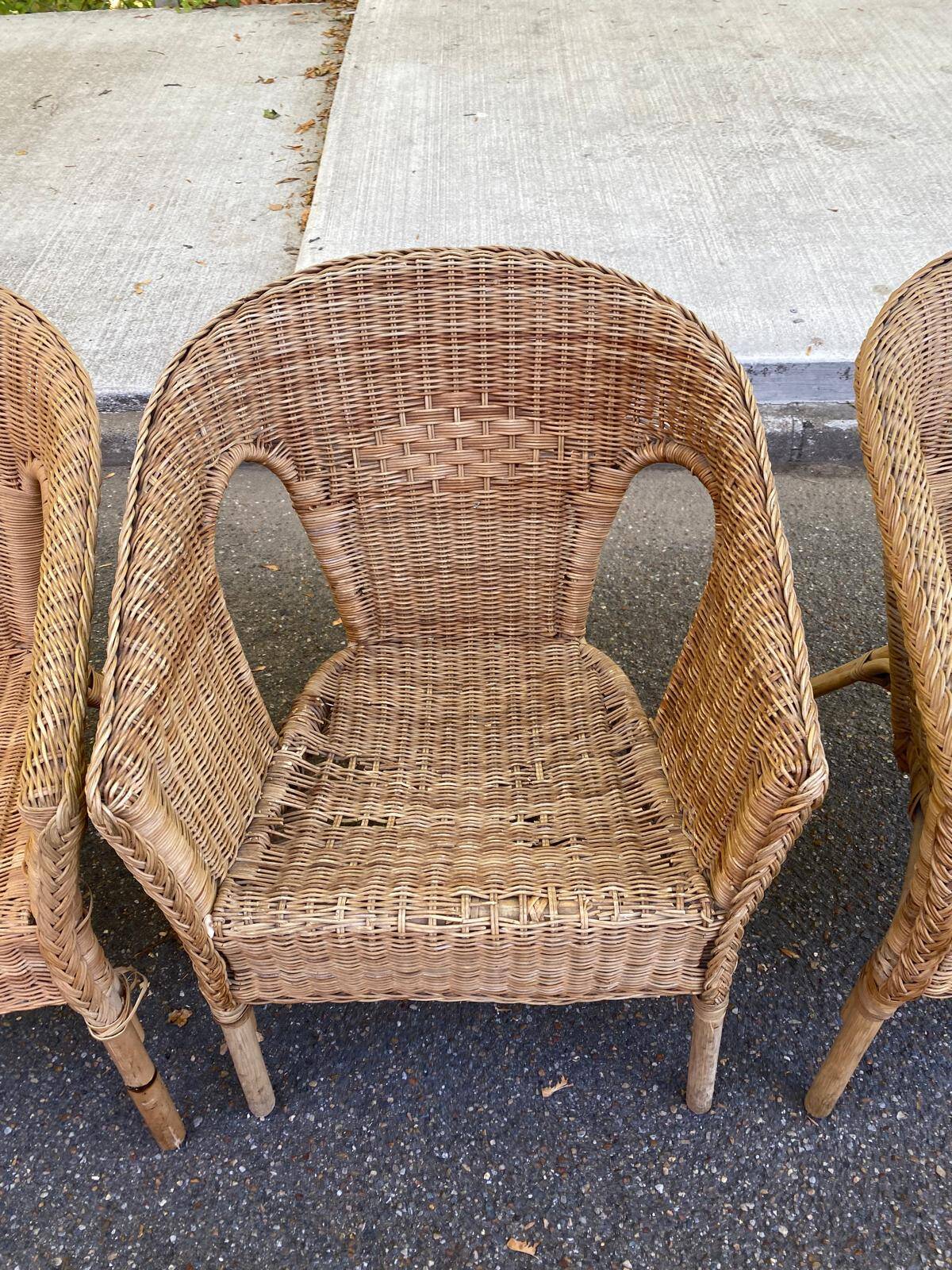 Rattan and woven wicker armchair in vintage bohemian style