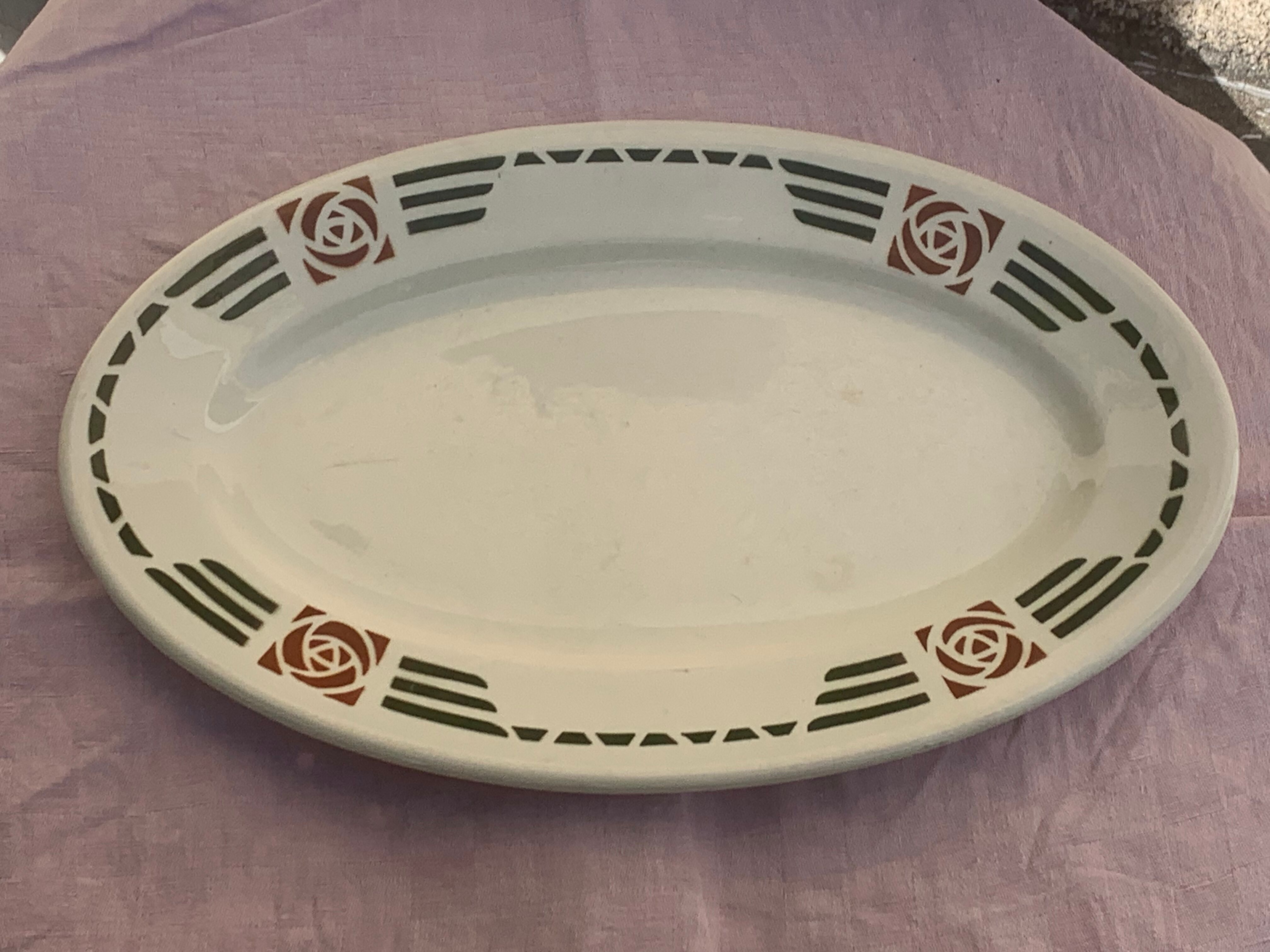 Serving dish in charcoal earthenware model Courbet art deco