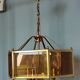 Brass pendant lamp and five-faceted vintage smoked glasses