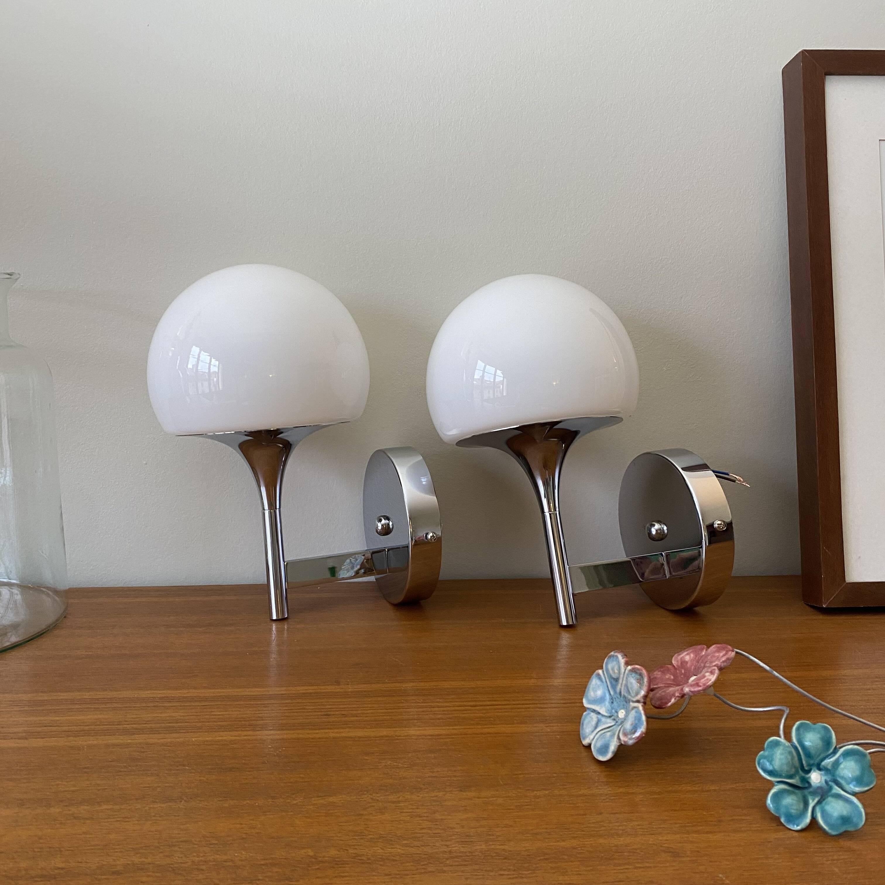 Pair of seventies wall sconces with chrome metal and opaline glass globe.
