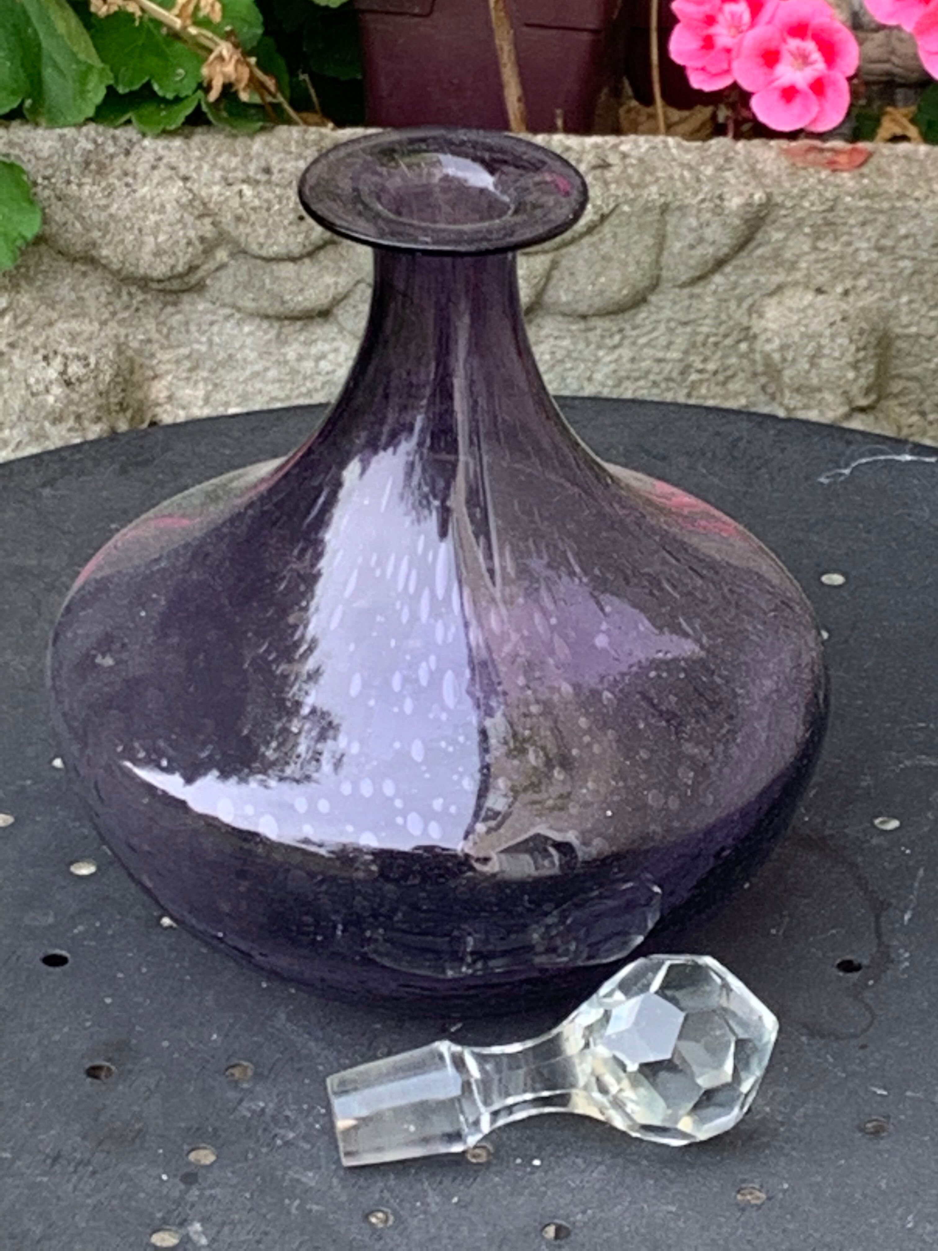 Bubble and purple blown glass decanter and faceted cut glass cap