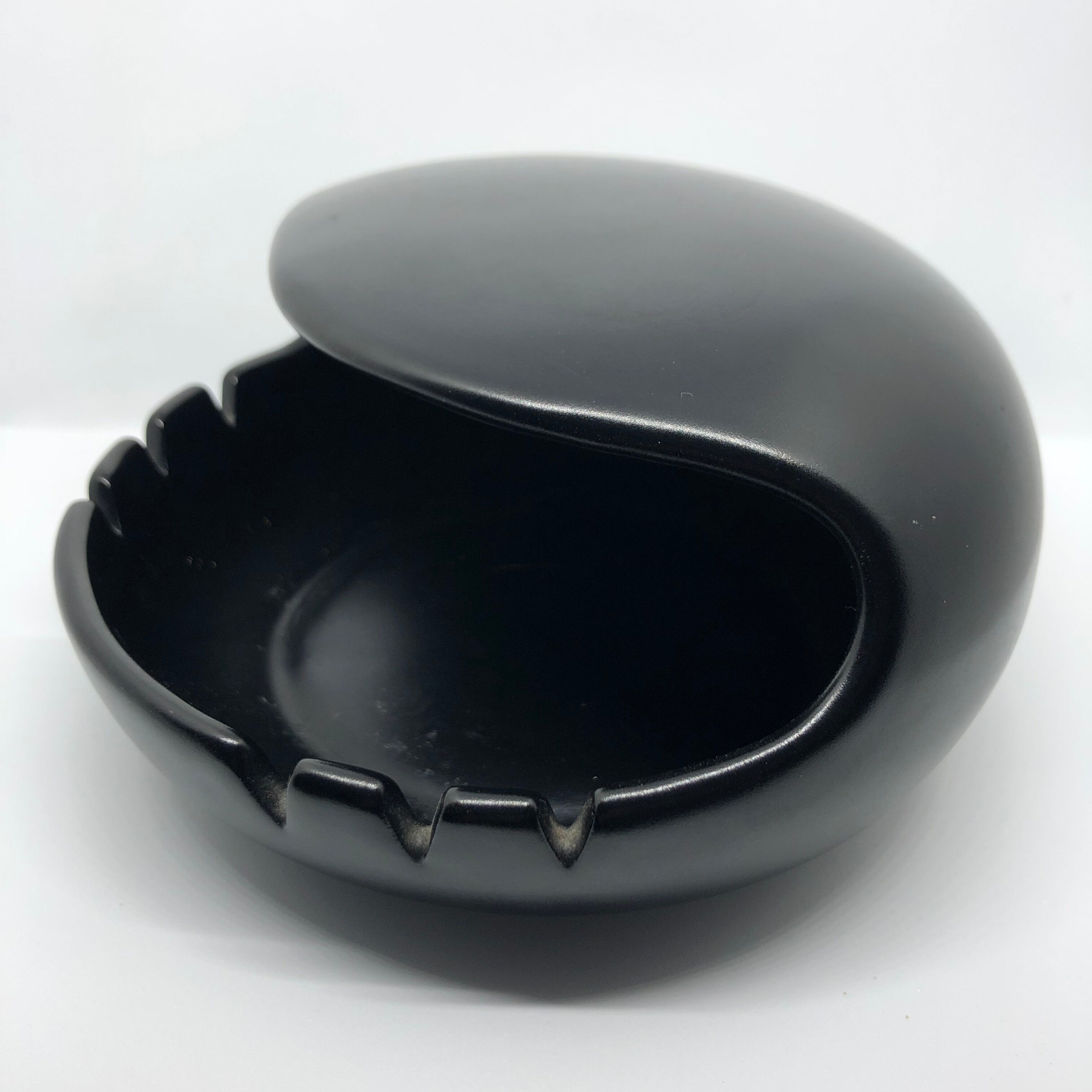 Vintage black ceramic ashtray