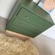 Vintage olive green chest of drawers with striped base