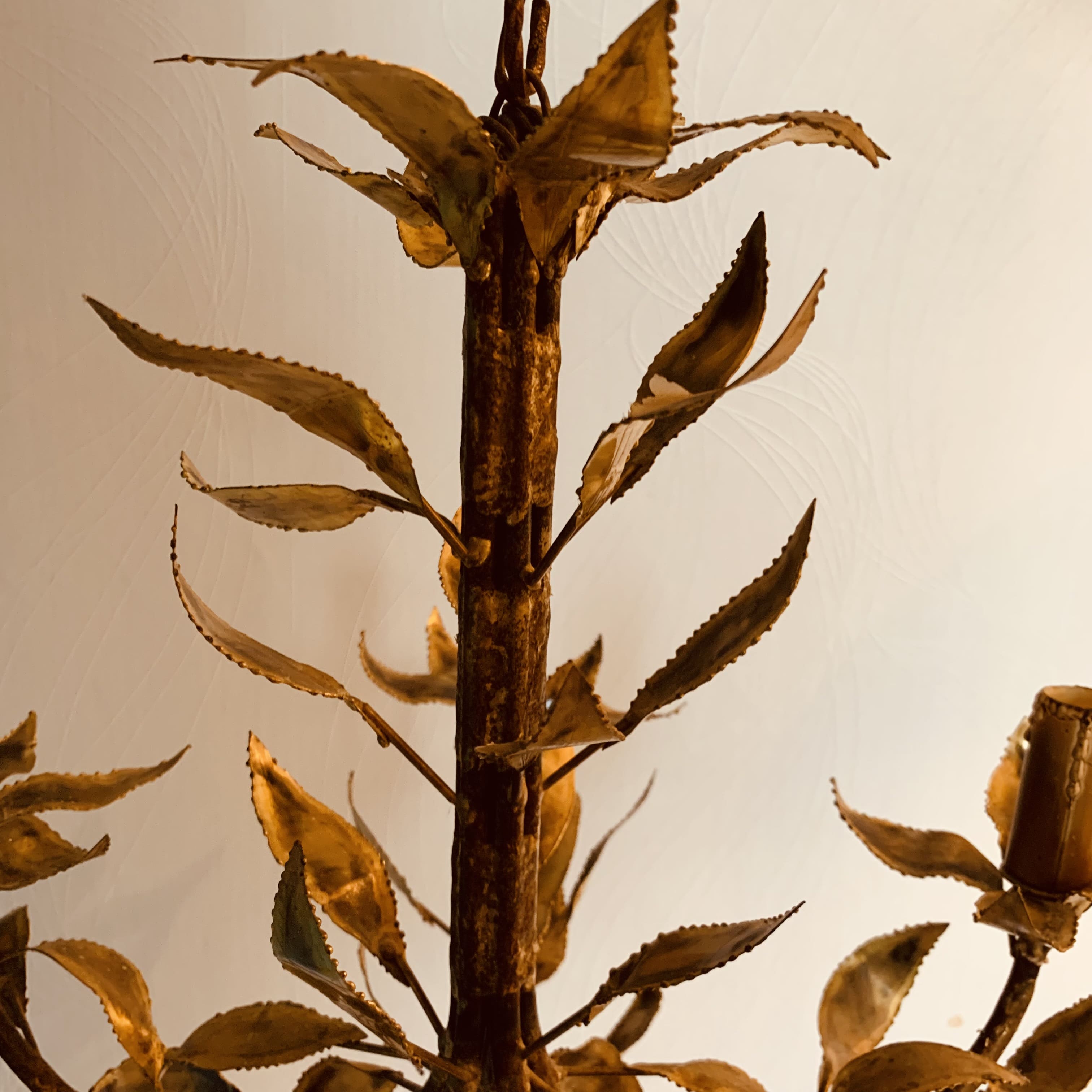 Vintage chandelier foliage decoration