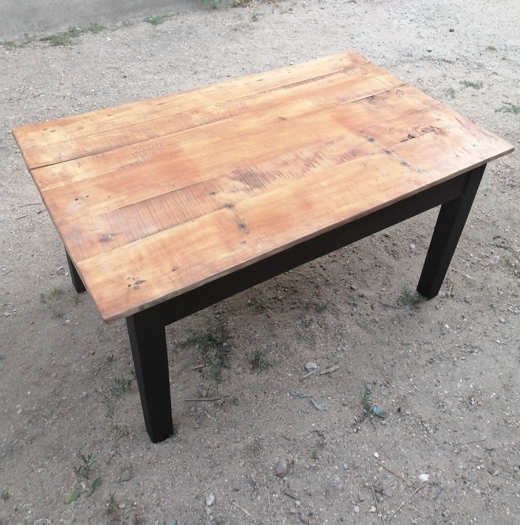 Wooden coffee table with a drawer
