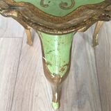 Old wooden tripod table in Venetian style