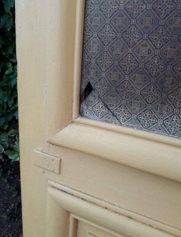 Porte d'entrée cintrée double en chêne, grilles et verre, XIXème
