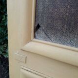 Porte d'entrée cintrée double en chêne, grilles et verre, XIXème