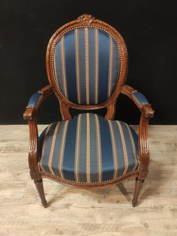 Suite de quatre fauteuils style louis XVl