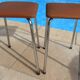 2 vintage stools with faux leather tops