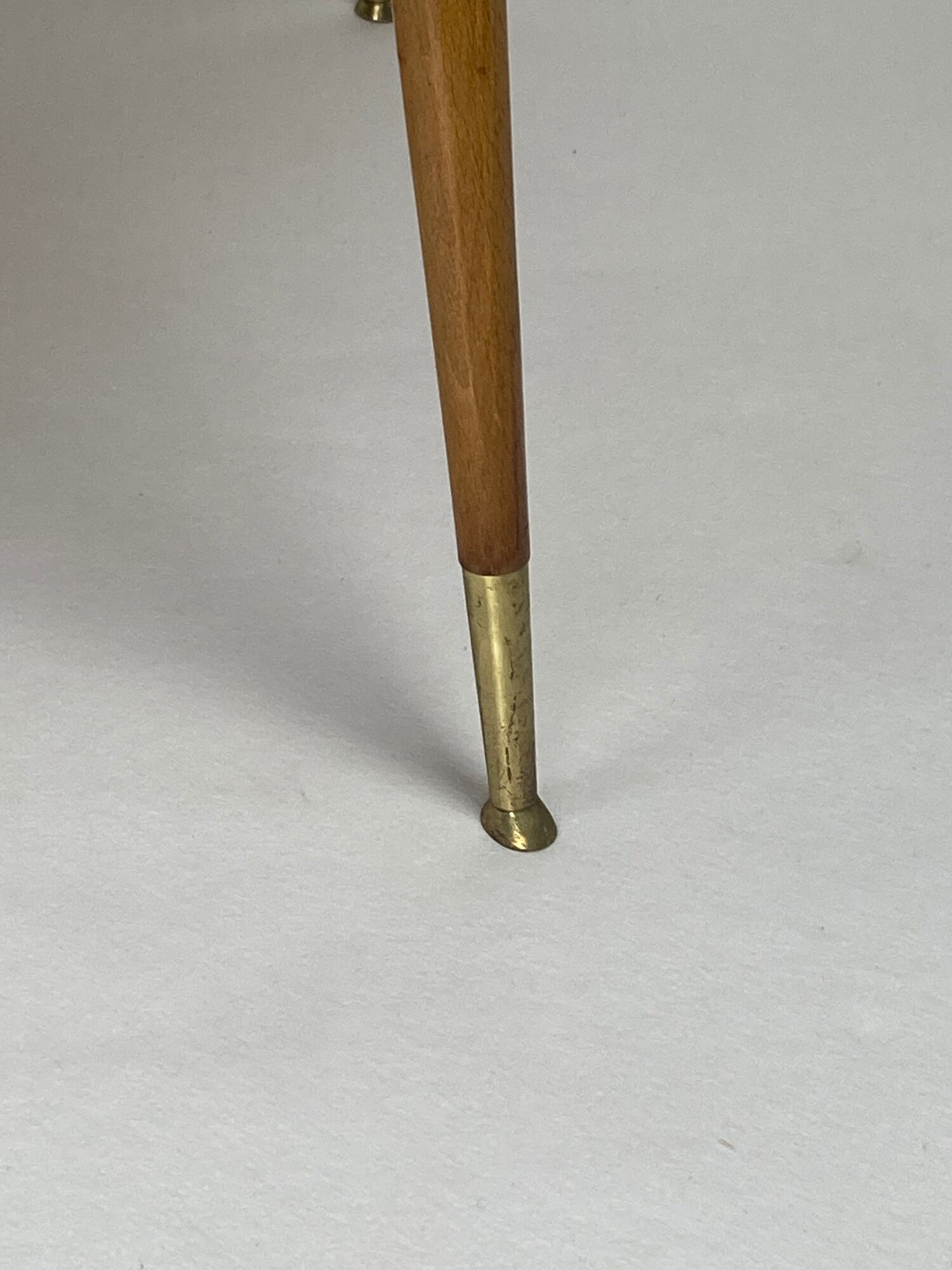 Italian round table with tapered brass leg ends, 1950s
