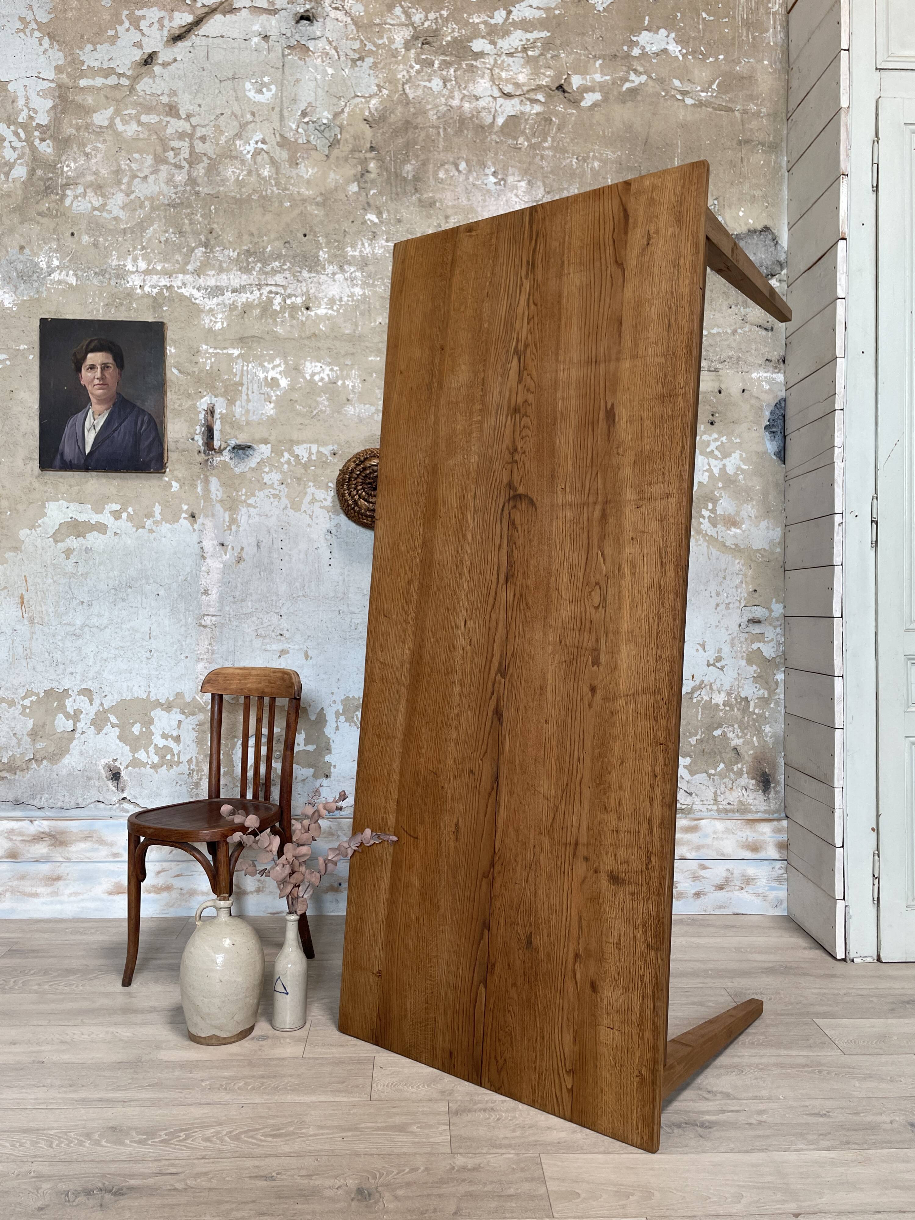 Vintage farm table with spindle legs.