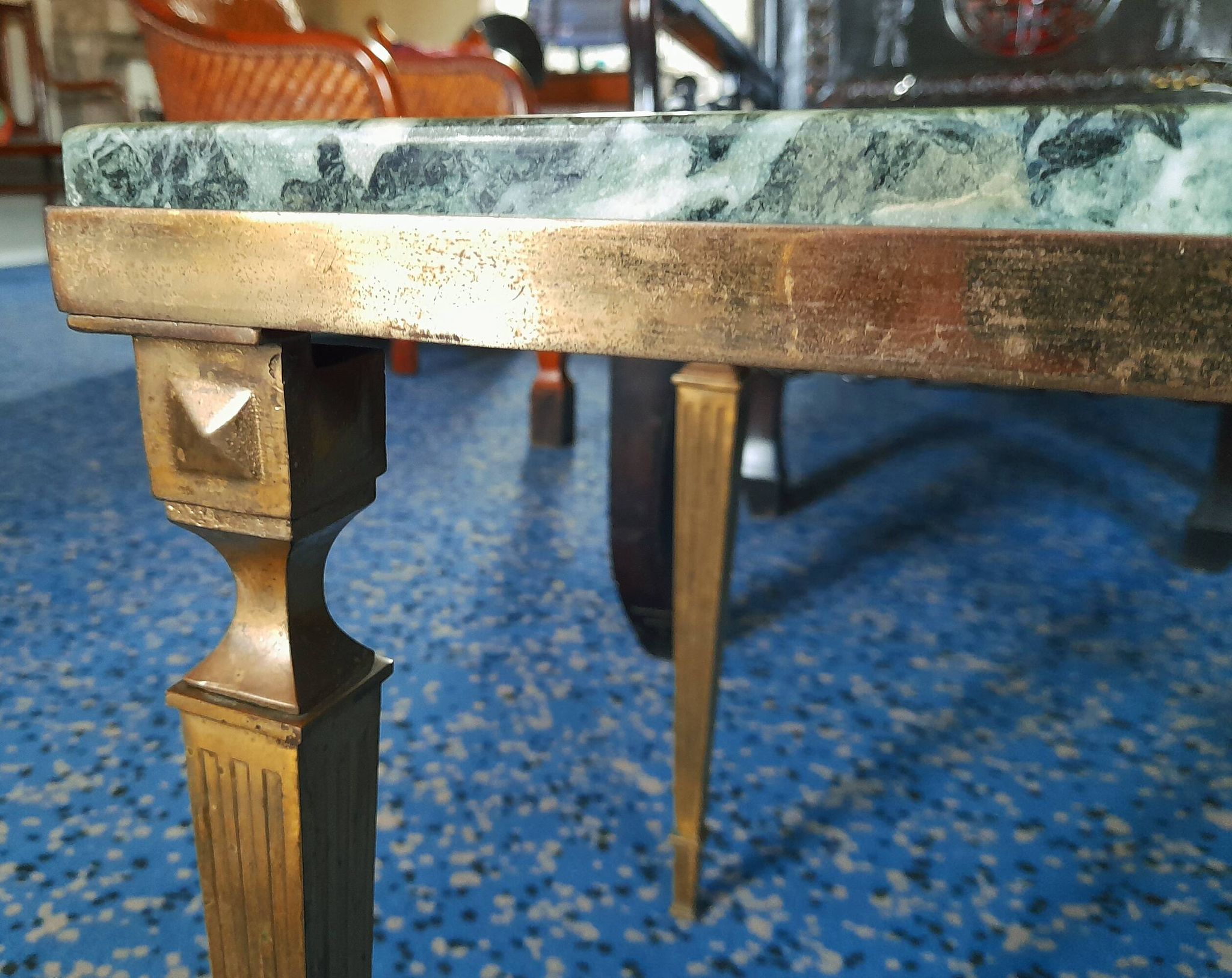 Coffee table in gilded bronze and green Alpine marble