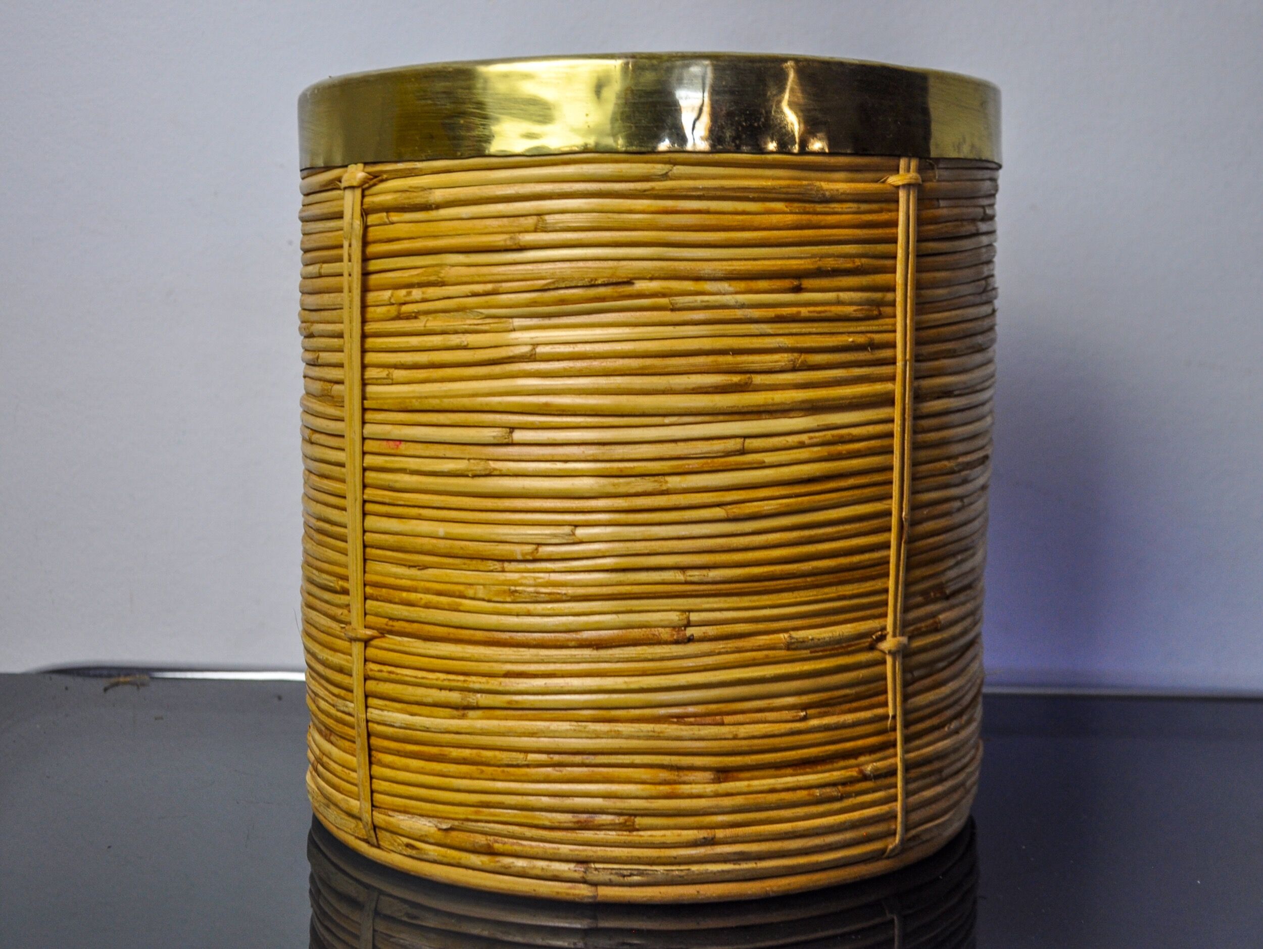 Rattan and brass book basket, Italy, 1970, 25 diam