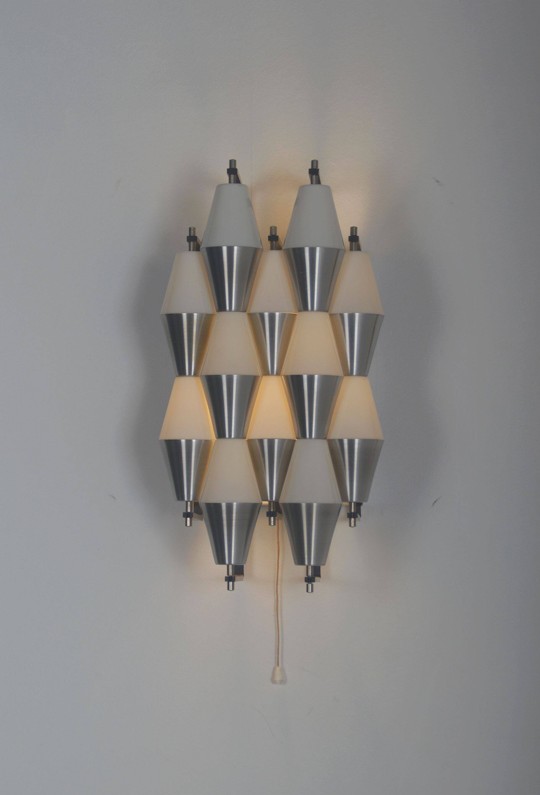 Rare set of wall lamps 'ludiek' by raak, 1960s