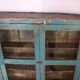 Old showcase in original blue patina Burmese teak