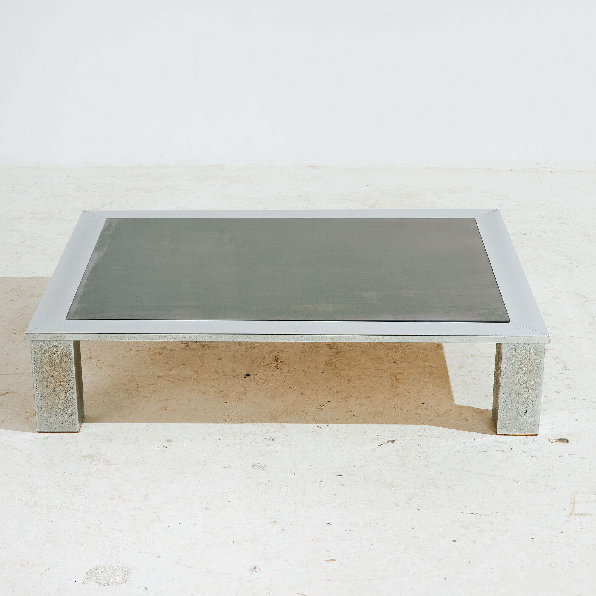 Chrome and glass coffee table.