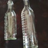 2 old graduated pharmacy bottles