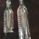 2 old graduated pharmacy bottles