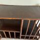Brown rattan console shelf