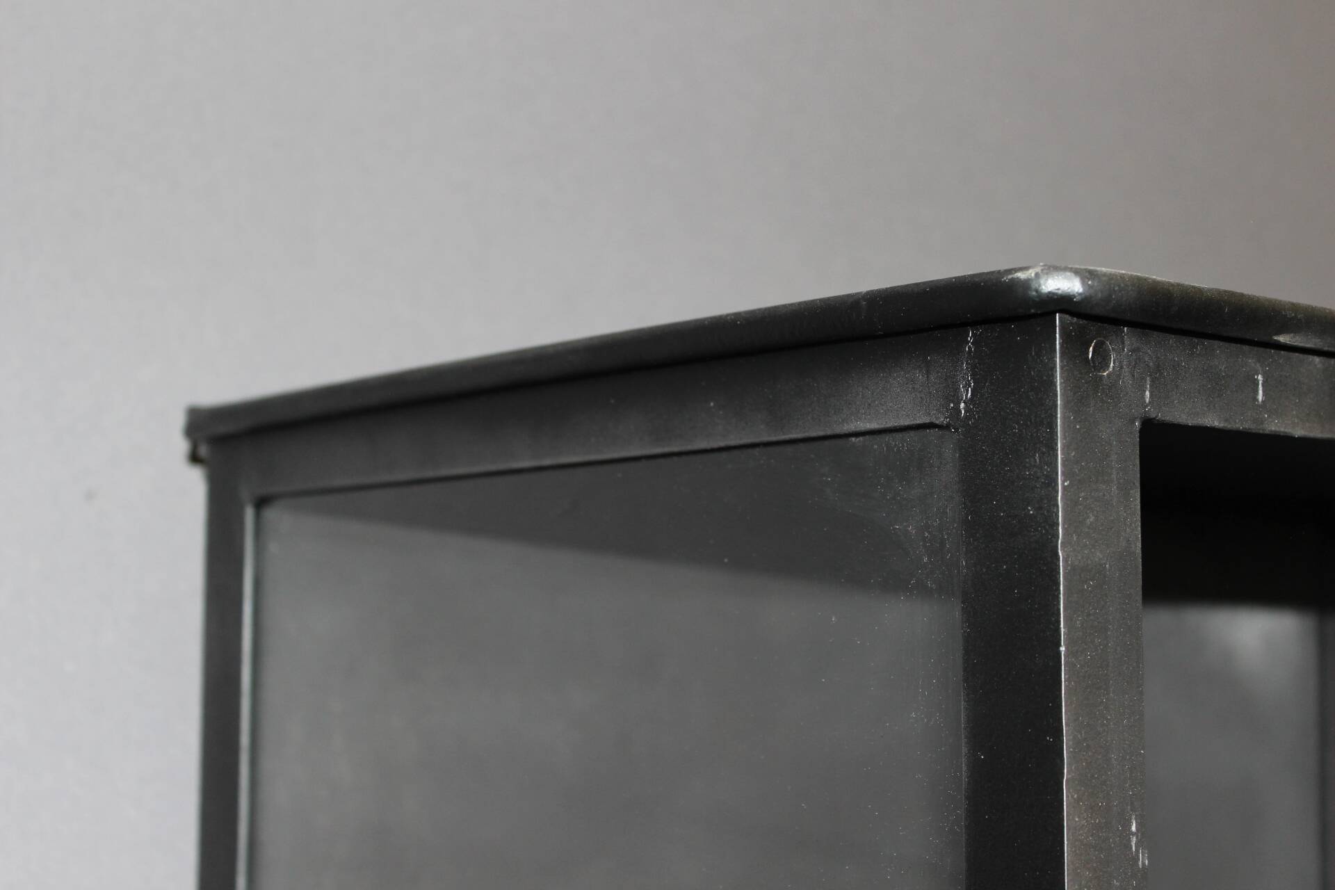 Iron display cabinet with black patina from around 1920