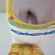 Fleur-de-lis shaped vase, glazed ceramic, Brittany, Quimper, Breton ermines, character