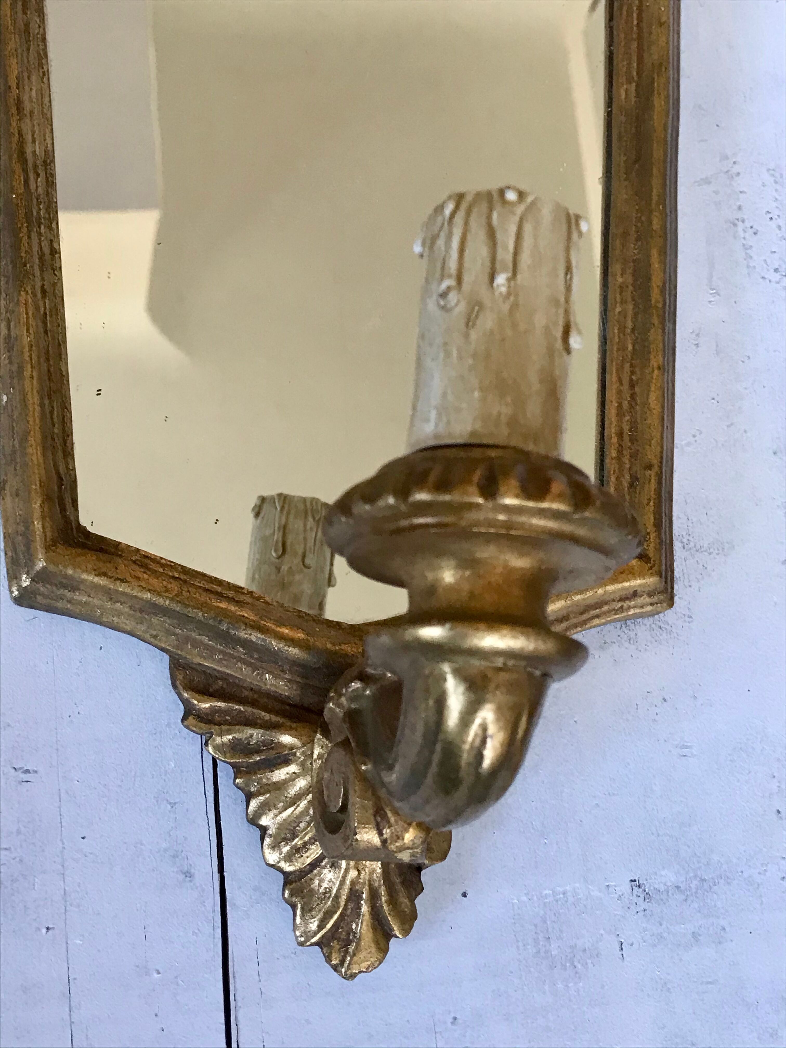 Pair of florentine wall lamps