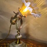 1920 bronze and brass rocking lamp with translucent amber-colored shade