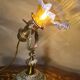 1920 bronze and brass rocking lamp with translucent amber-colored shade