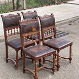 4 Henri II chairs in solid wood and leather from the 19th century.