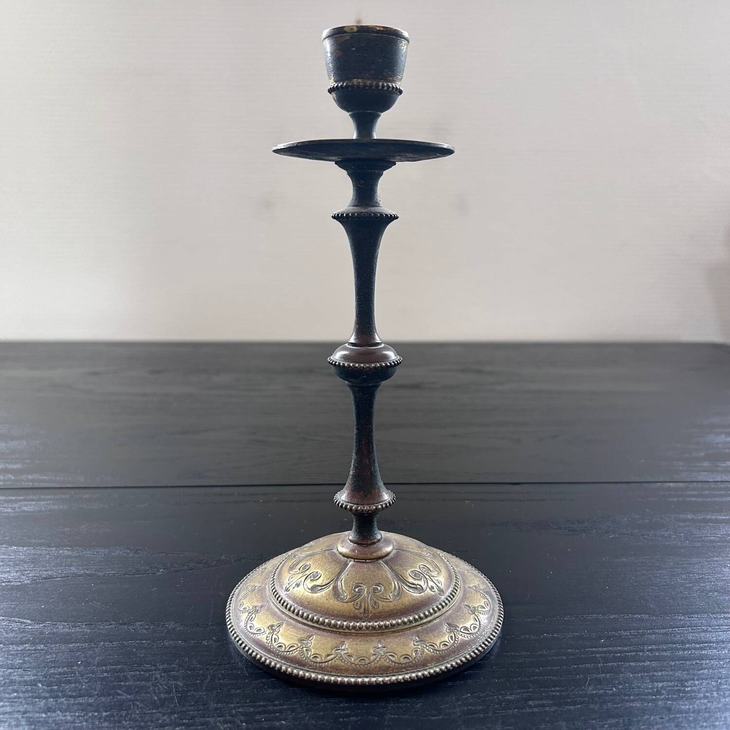 Chiseled brass candlestick