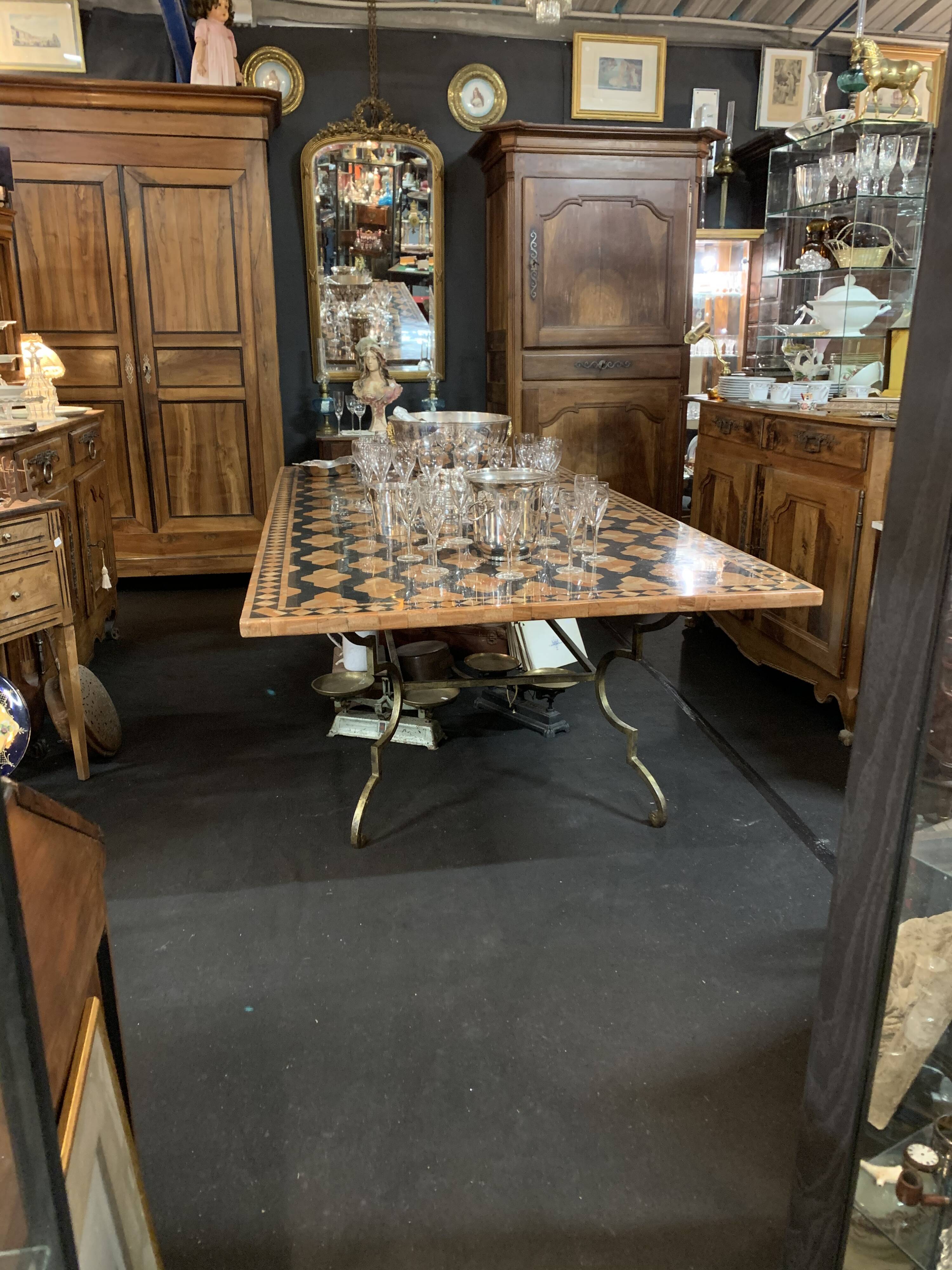 Wrought iron table on marble